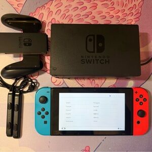 Nintendo Switch Console with Blue and Red Joy-Con